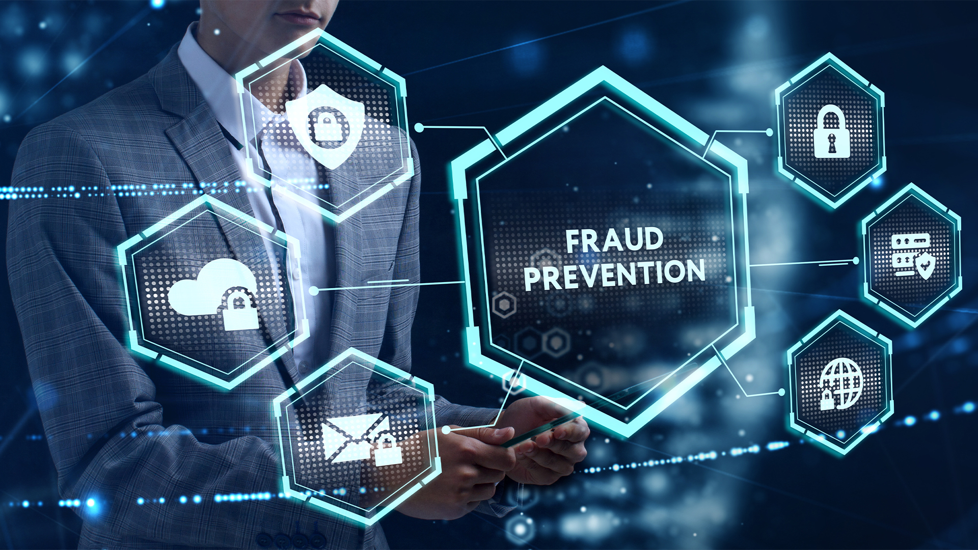 Young businessman select the icon Fraud prevention on the virtual display